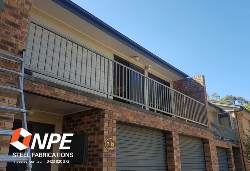 A balcony with metal balustrades.